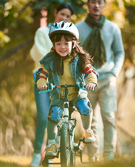 Girl ridding a bicycle