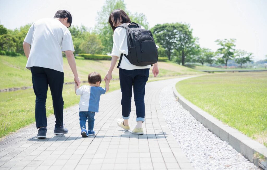Parents with child on a walk