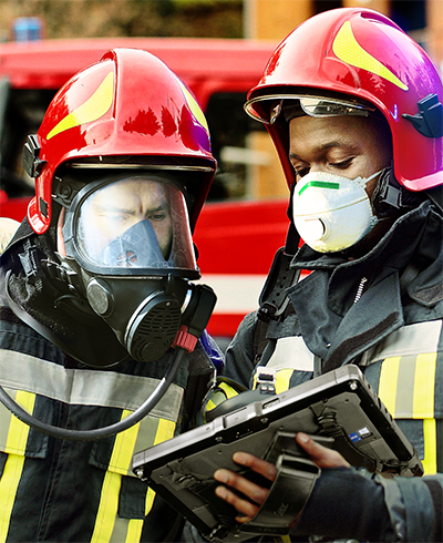 Firefighters checking plans on the tablet