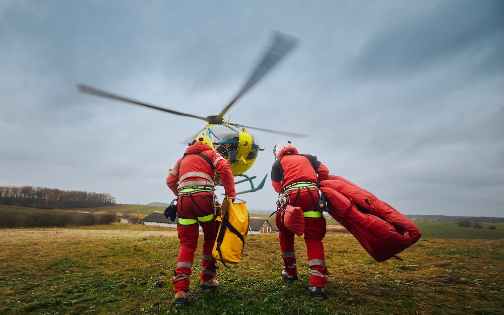 Paramedics are heading for the rescue helicopter
